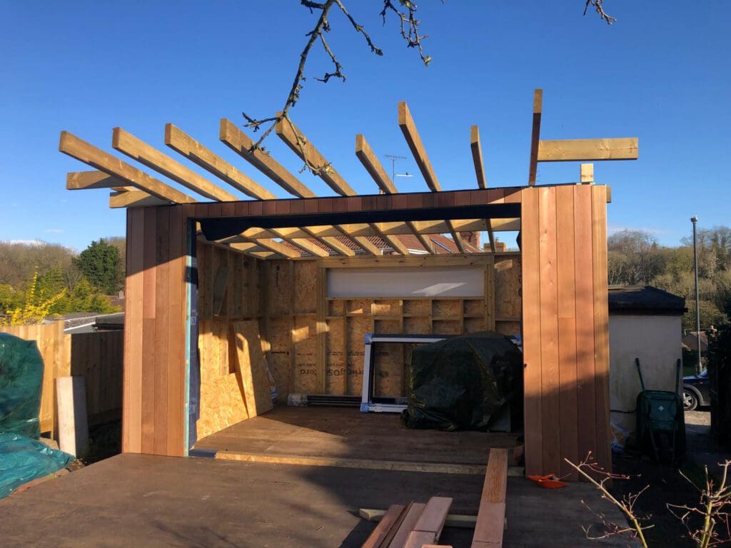 Timber-framed garden room under construction by RSJ Construction in Bristol